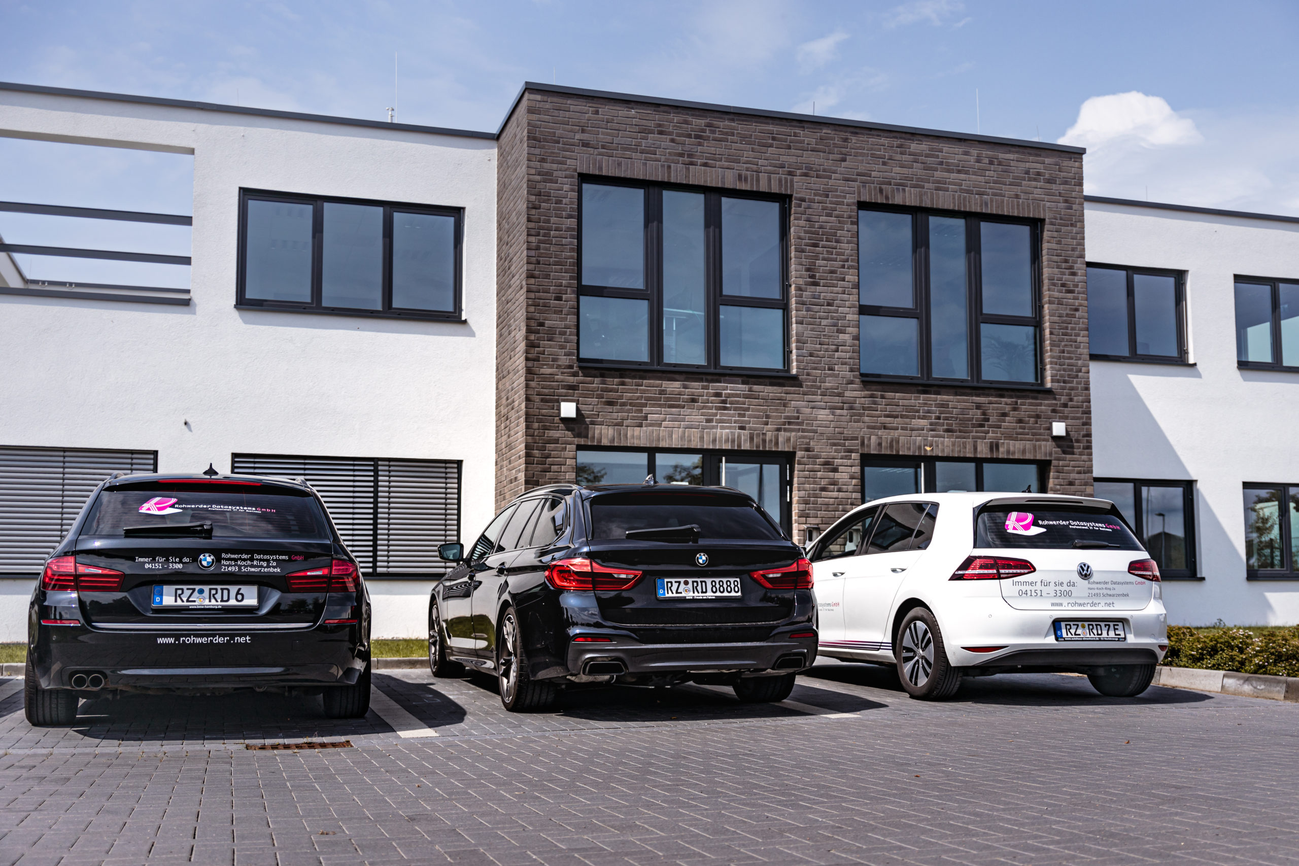 Cars in front of the company